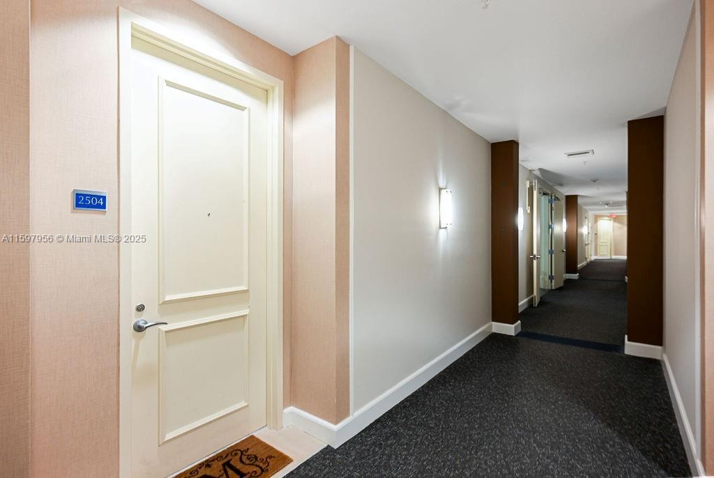 corridor with baseboards