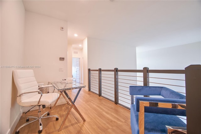 office area with light hardwood / wood-style flooring