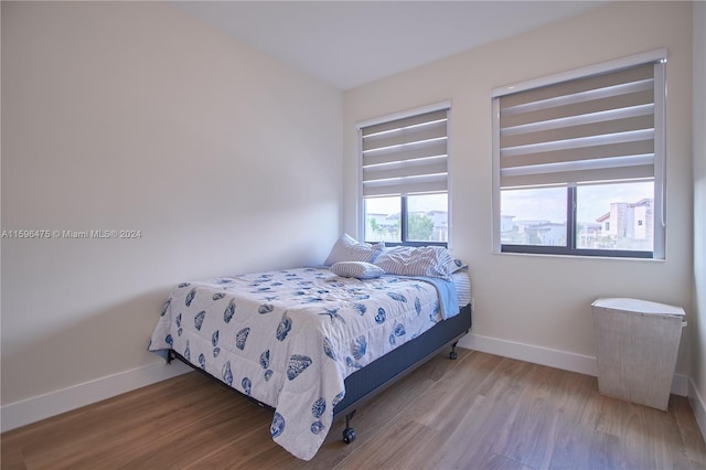 bedroom featuring wood-type flooring