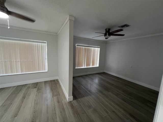 unfurnished room featuring ceiling fan, crown molding, and hardwood / wood-style flooring