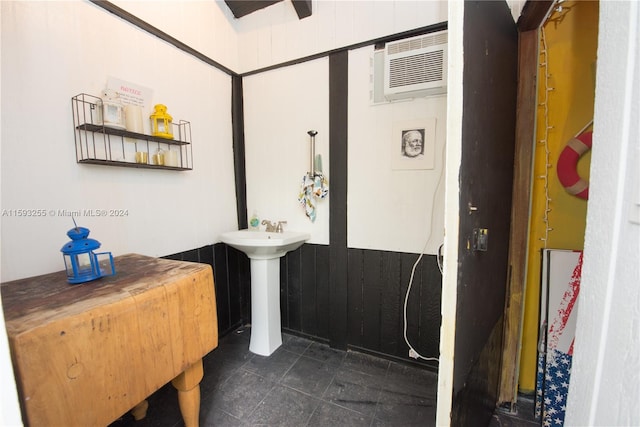 bathroom featuring tile flooring and sink