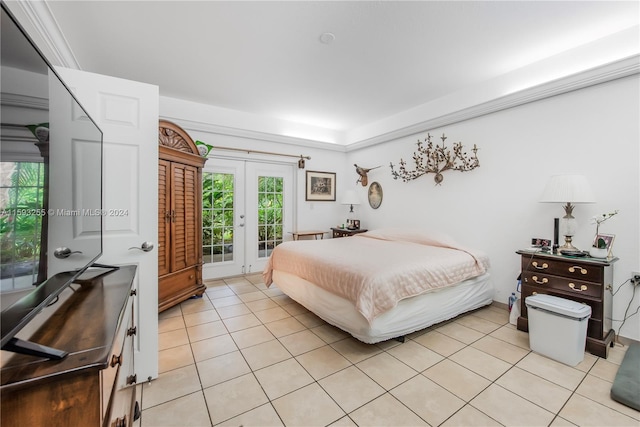 bedroom featuring french doors, access to outside, and light tile floors