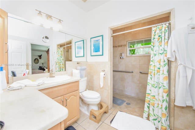 bathroom with oversized vanity, tile walls, walk in shower, tile floors, and toilet