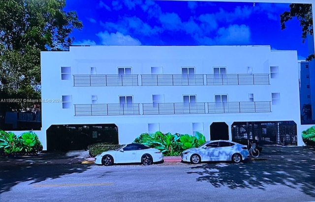 view of outdoor building at dusk