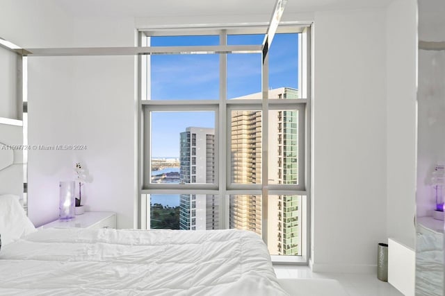 bedroom featuring tile floors