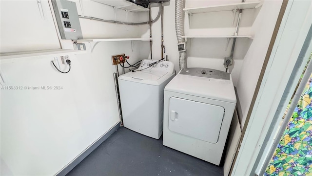 laundry area with separate washer and dryer