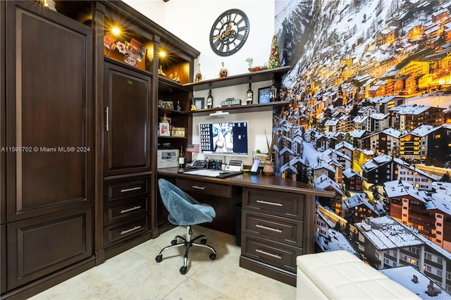 office with built in desk and tile flooring