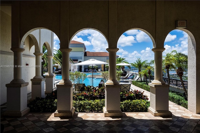 view of patio with a community pool