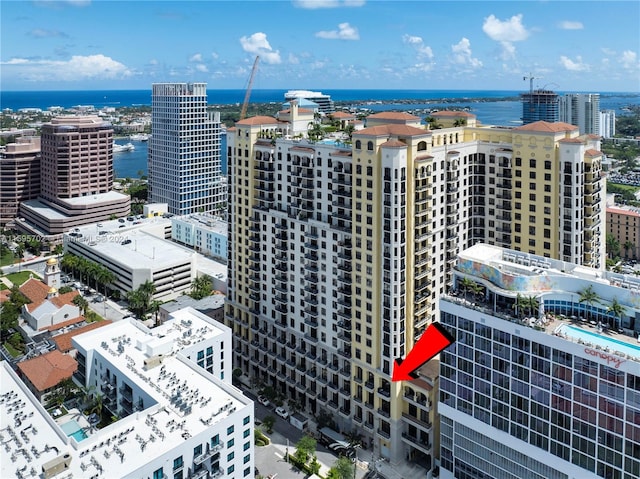 birds eye view of property featuring a water view