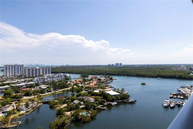 birds eye view of property featuring a water view