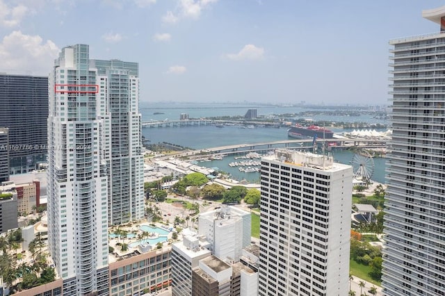 bird's eye view featuring a view of city and a water view