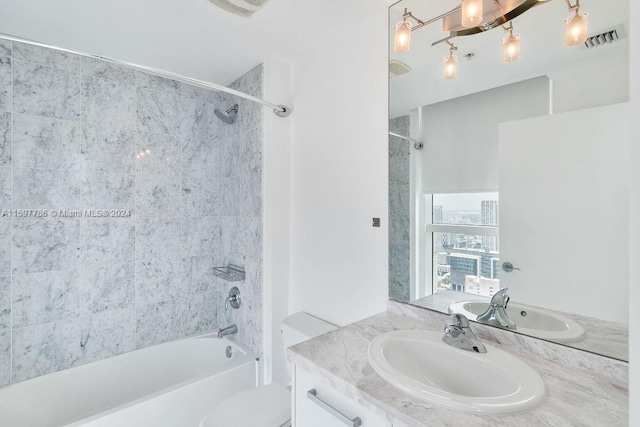 full bathroom featuring shower / bath combination, visible vents, vanity, and toilet