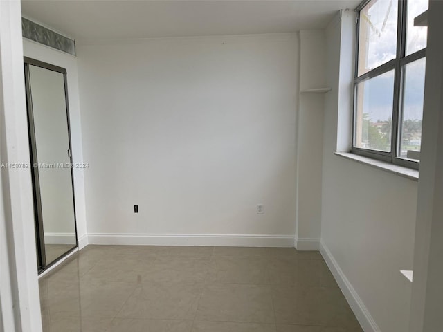 view of tiled empty room