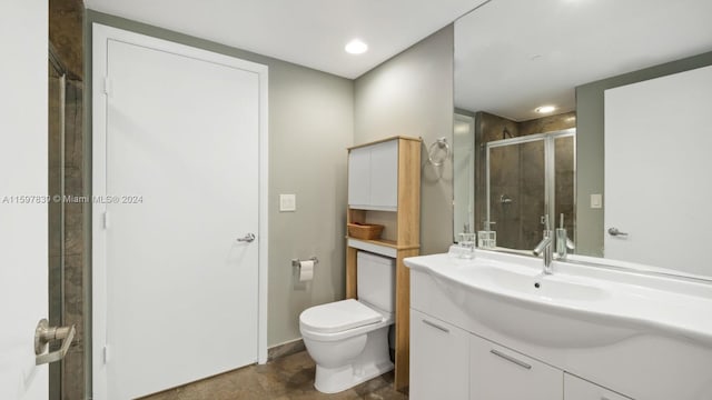 bathroom featuring tile flooring, oversized vanity, and toilet