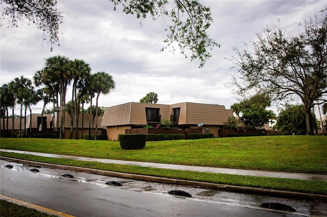 exterior space with a lawn