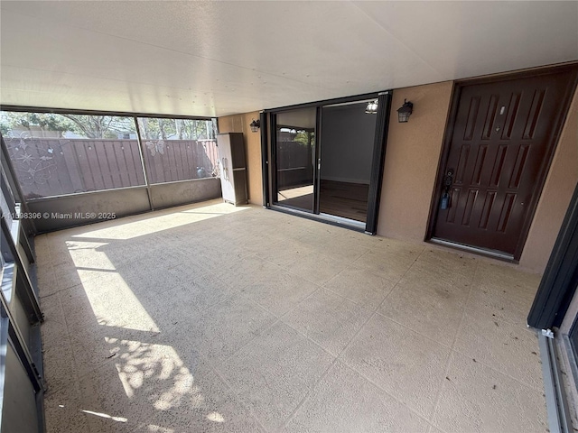 view of unfurnished sunroom