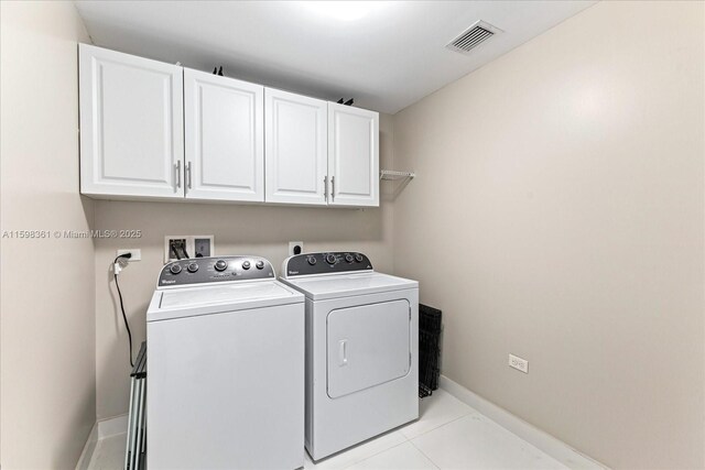 kitchen featuring pendant lighting, appliances with stainless steel finishes, built in desk, white cabinetry, and sink