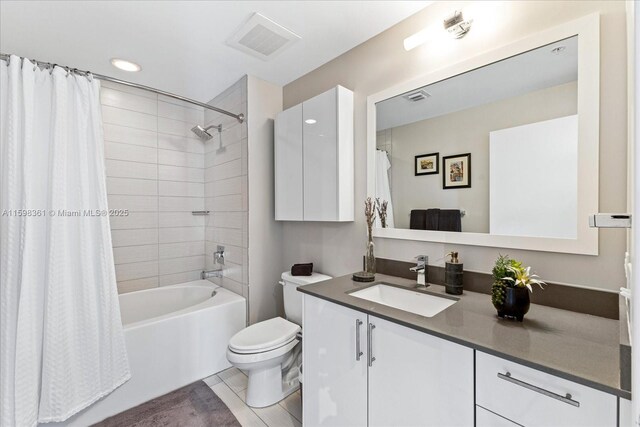 bedroom with ceiling fan and light tile patterned floors