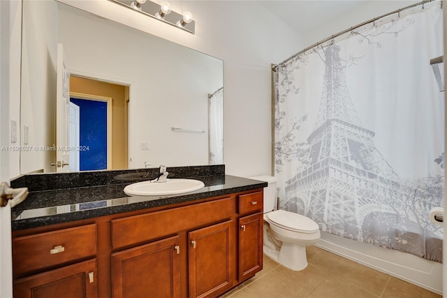 full bathroom with tile patterned flooring, vanity, shower / bath combination with curtain, and toilet