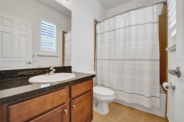 full bathroom with tile patterned floors, vanity, shower / bathtub combination with curtain, and toilet