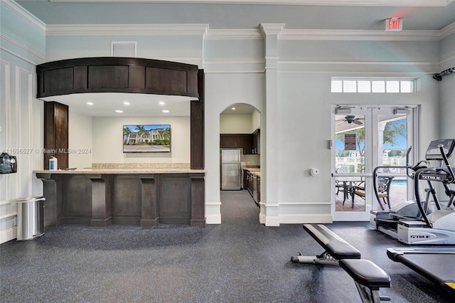 kitchen featuring stainless steel fridge, french doors, and ornamental molding