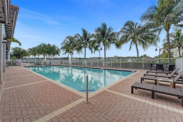 view of pool featuring a patio