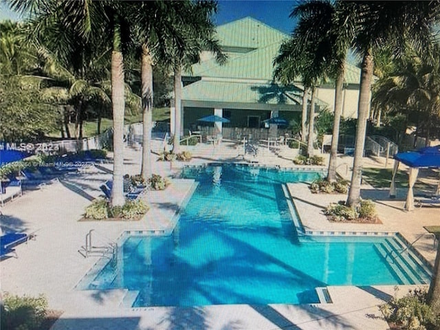 view of pool with a patio area