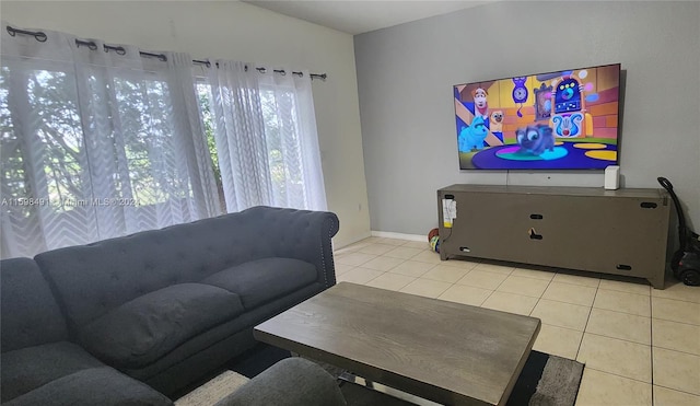 living room with tile patterned flooring