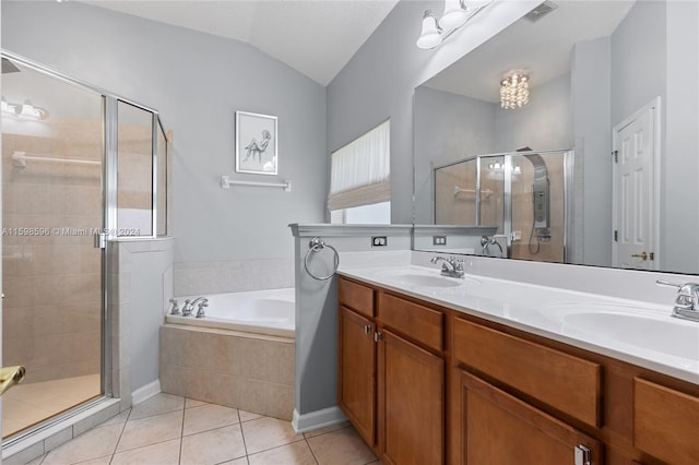 bathroom featuring double vanity, tile patterned floors, independent shower and bath, and vaulted ceiling