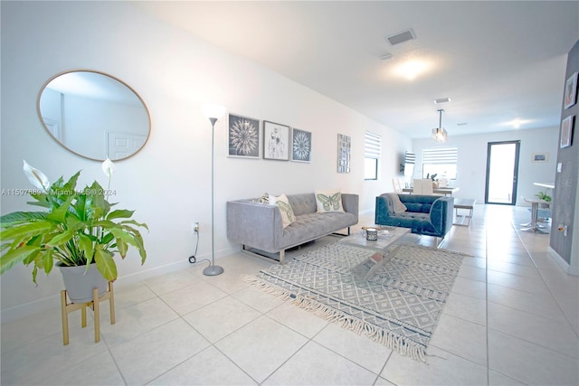 living room with light tile patterned floors