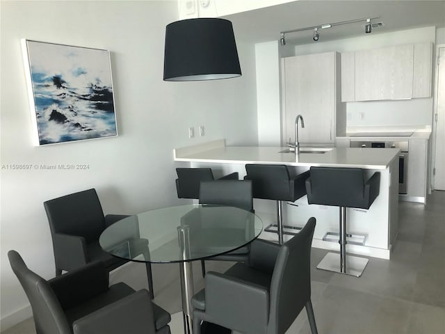 dining area featuring sink