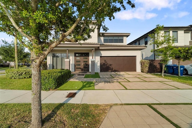 view of front of home with a garage