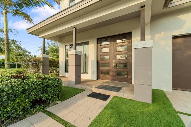 property entrance featuring covered porch