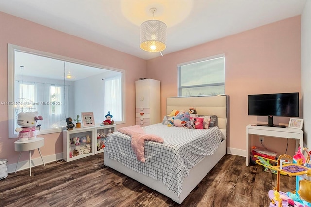 bedroom featuring dark hardwood / wood-style flooring