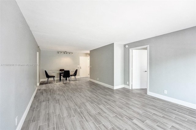 spare room featuring light wood-type flooring