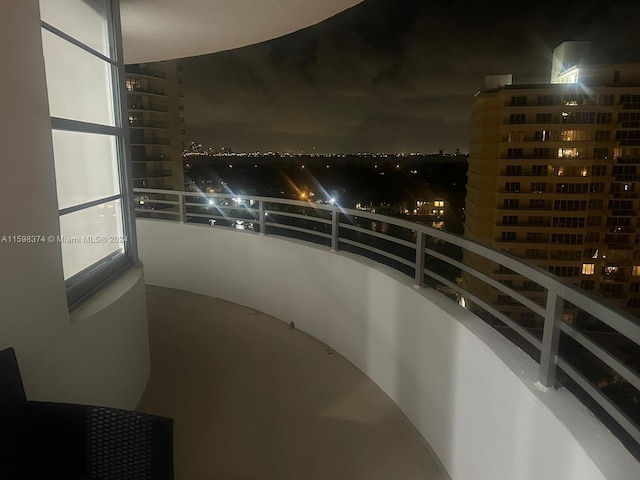 view of balcony at night