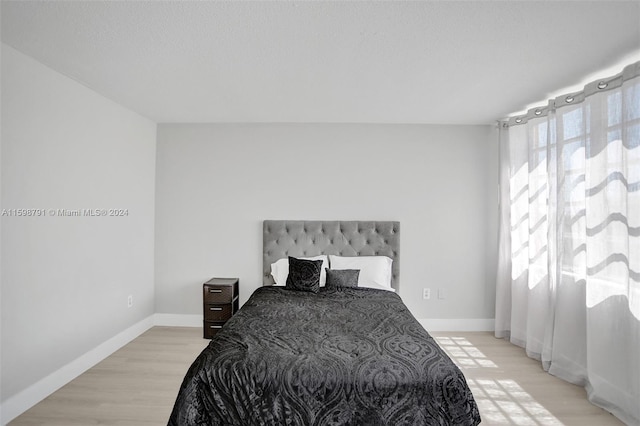 bedroom featuring light hardwood / wood-style flooring