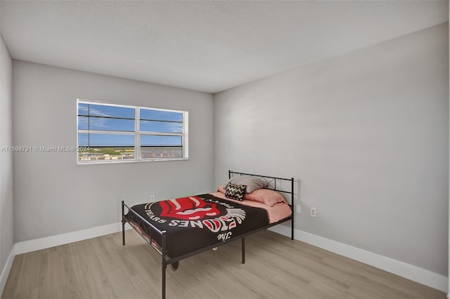 bedroom featuring light hardwood / wood-style flooring