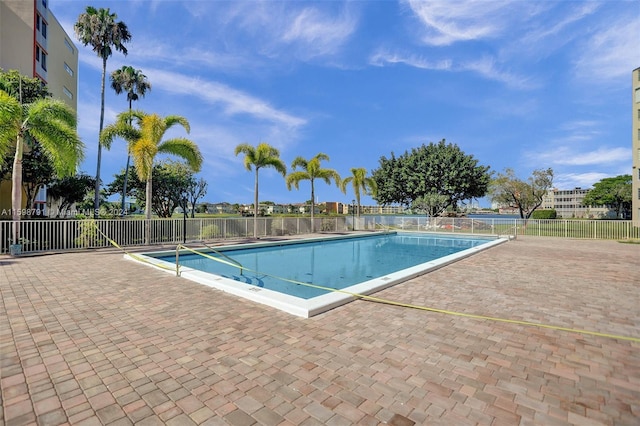 view of swimming pool featuring a patio