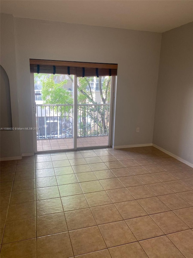 view of tiled empty room