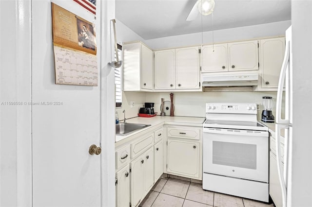 kitchen featuring ceiling fan, sink, light tile patterned floors, and white appliances