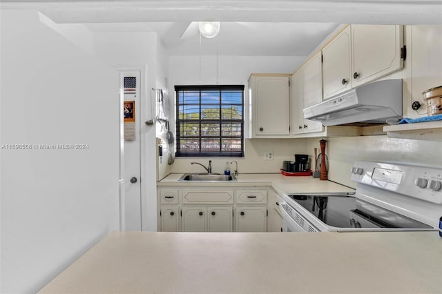 kitchen featuring sink and electric range oven