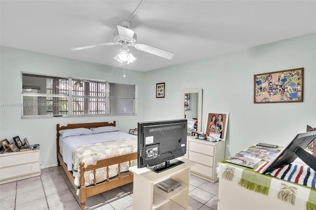 bedroom featuring ceiling fan and light tile patterned flooring