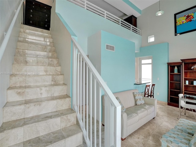 stairs with a high ceiling