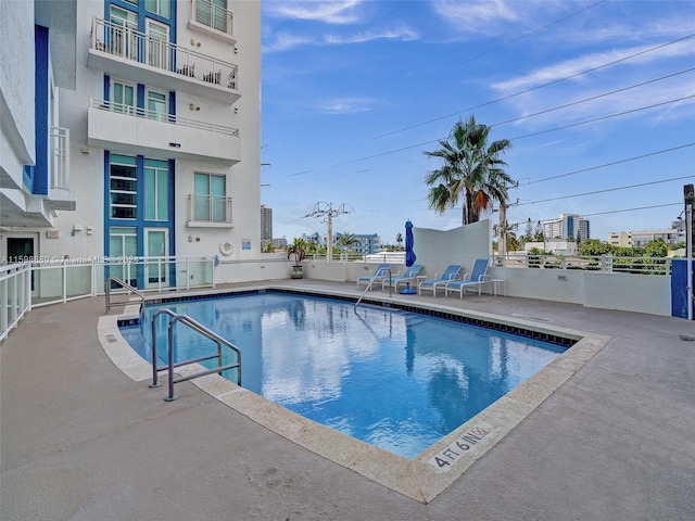 view of pool with a patio