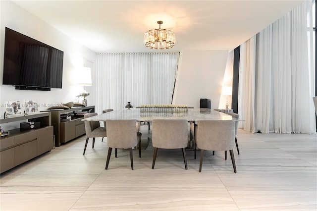 dining room with a chandelier