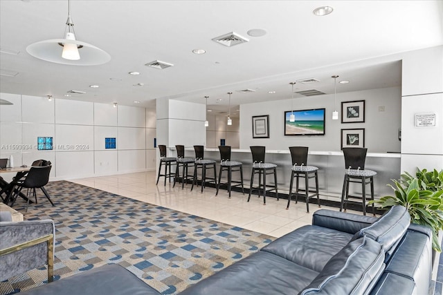 living room featuring light tile patterned floors