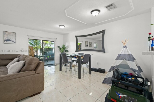 living room with light tile floors