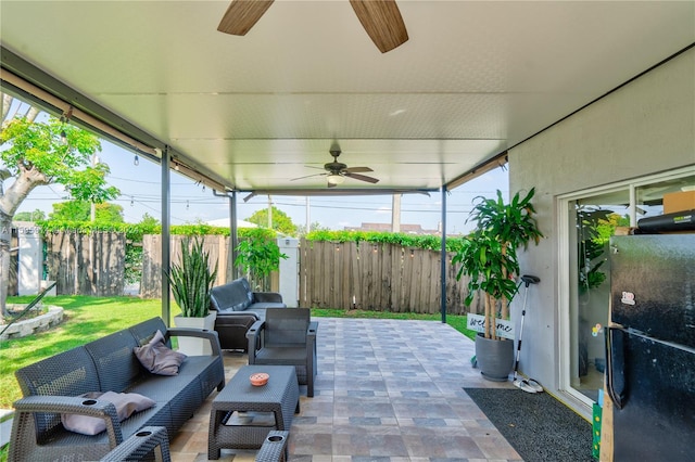 view of patio / terrace with ceiling fan and an outdoor hangout area