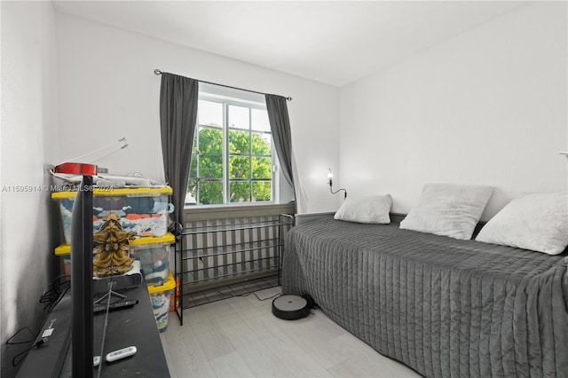 bedroom featuring hardwood / wood-style floors